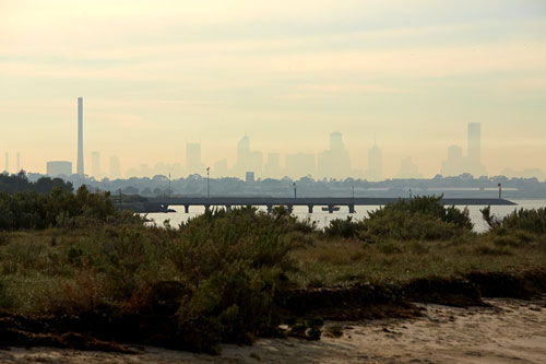 Distant view of Melbourne CBD under brown smog